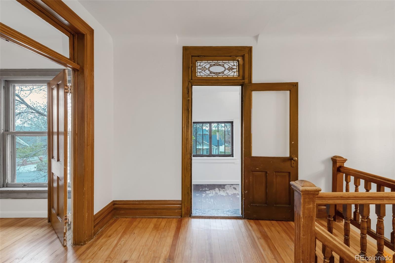 3905 Tejon Street Denver, CO 80211 - Photo 21 of 47 a view of front door with wooden floor