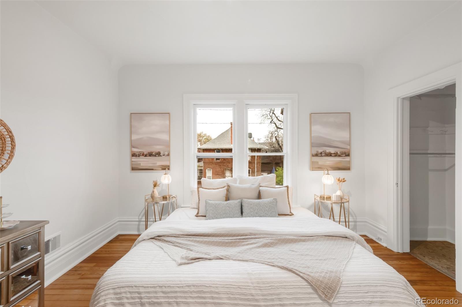 3905 Tejon Street Denver, CO 80211 - Photo 28 of 47 a bedroom with a bed and a window