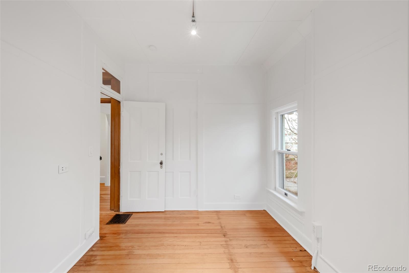 3905 Tejon Street Denver, CO 80211 - Photo 31 of 47 a view of an empty room and window