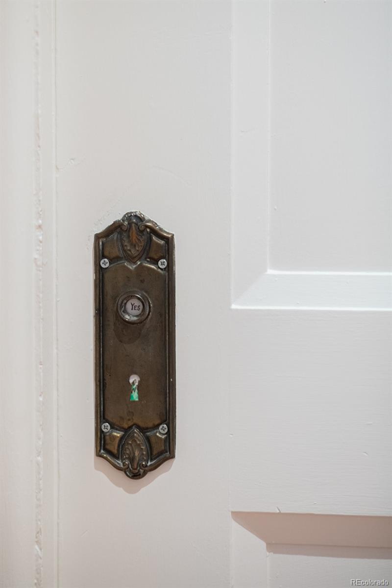 3905 Tejon Street Denver, CO 80211 - Photo 34 of 47 a room with a bench