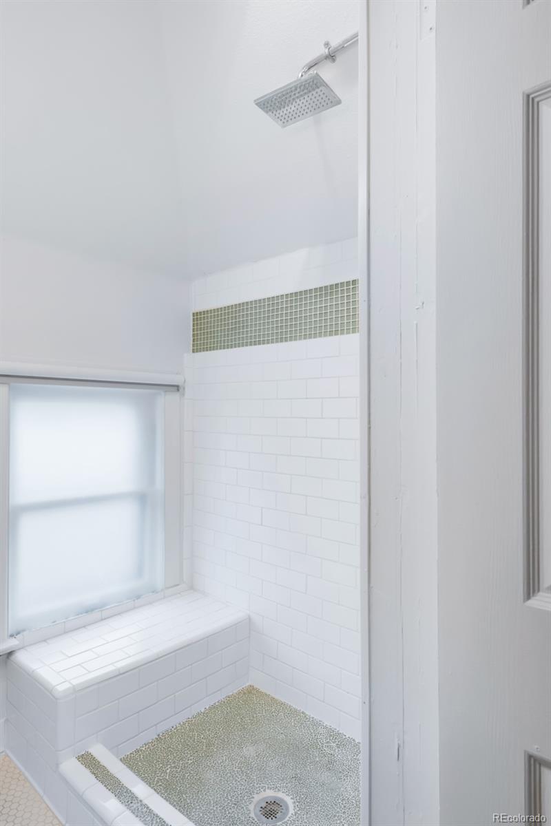 3905 Tejon Street Denver, CO 80211 - Photo 41 of 47 a bathroom with a bathtub