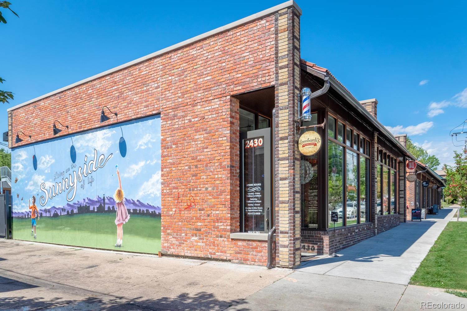 3905 Tejon Street Denver, CO 80211 - Photo 47 of 47 a front view of a house with garden