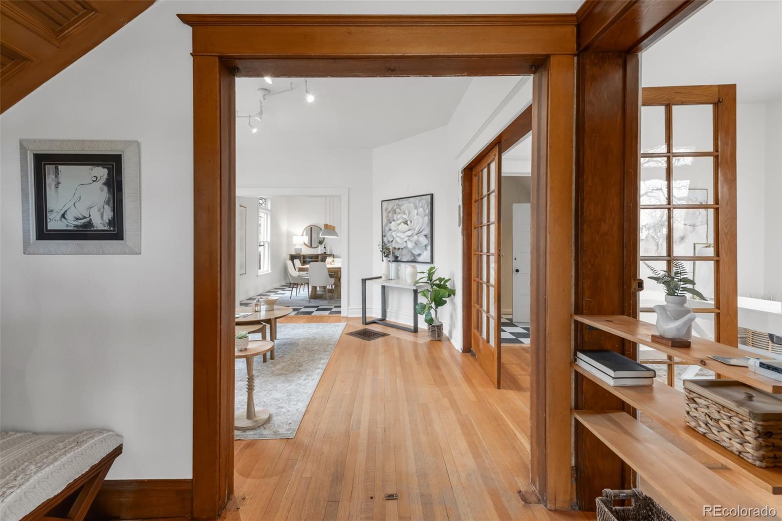 3905 Tejon Street Denver, CO 80211 - Photo 5 of 47 a view of a living room and hardwood floor