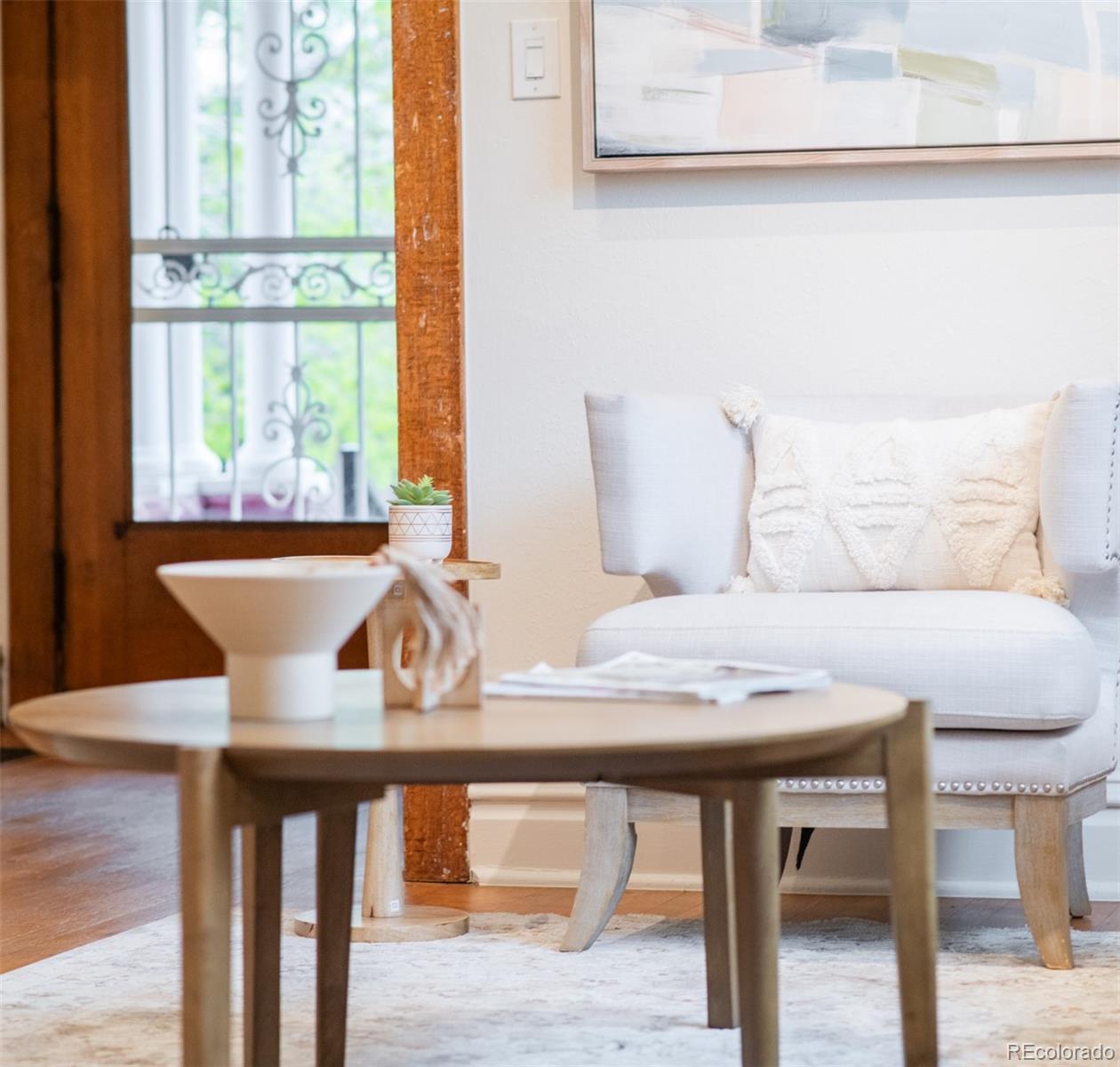 3905 Tejon Street Denver, CO 80211 - Photo 8 of 47 a view of a dining room with furniture window and wooden floor