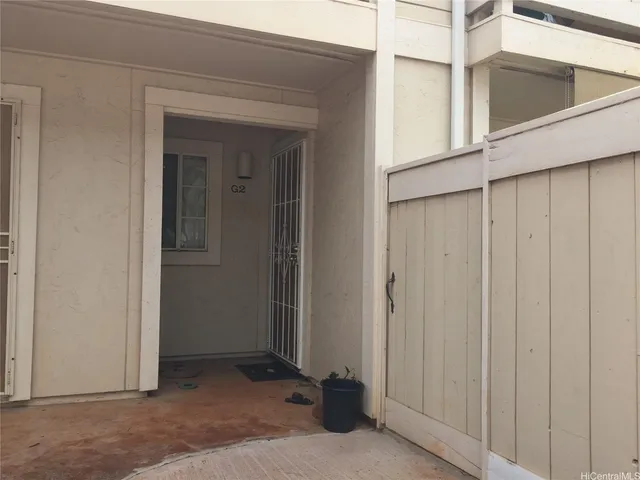 a view of a house with a wooden door
