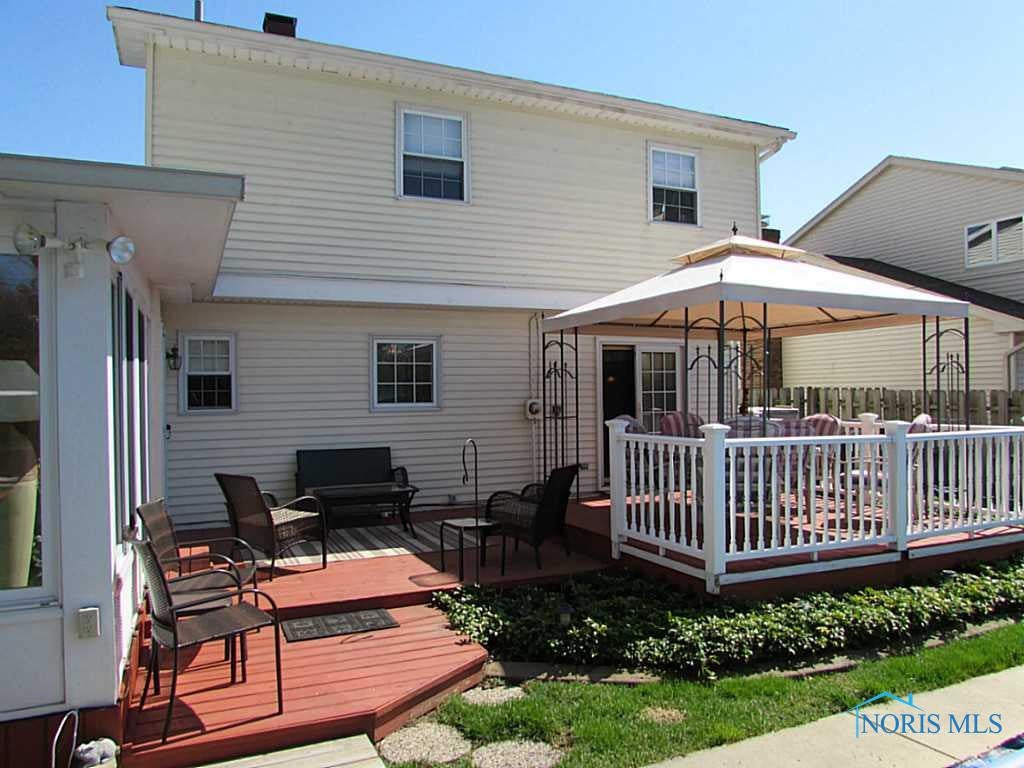 462 Eagle Point Road Rossford, OH 43460 - Photo 15 of 19 Exterior Back. Expanded deck is perfect for your guests, pool party and barbecue!
