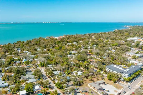 a view of a large body of water with a building in the background