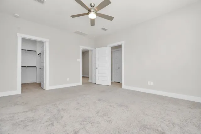 an empty room with a bathroom