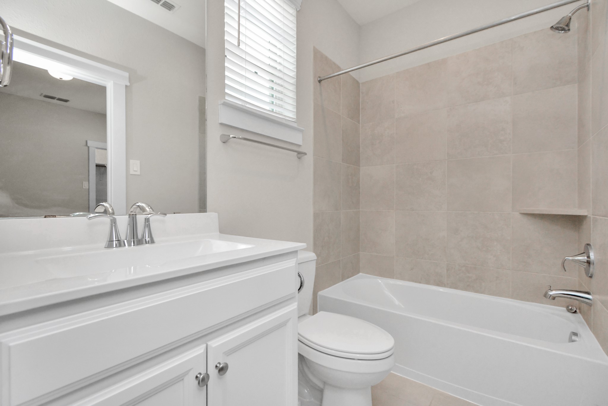 746 Strawberry Pines Court Houston, TX 77009 - Photo 37 of 50 a bathroom with a sink a toilet and a bathtub