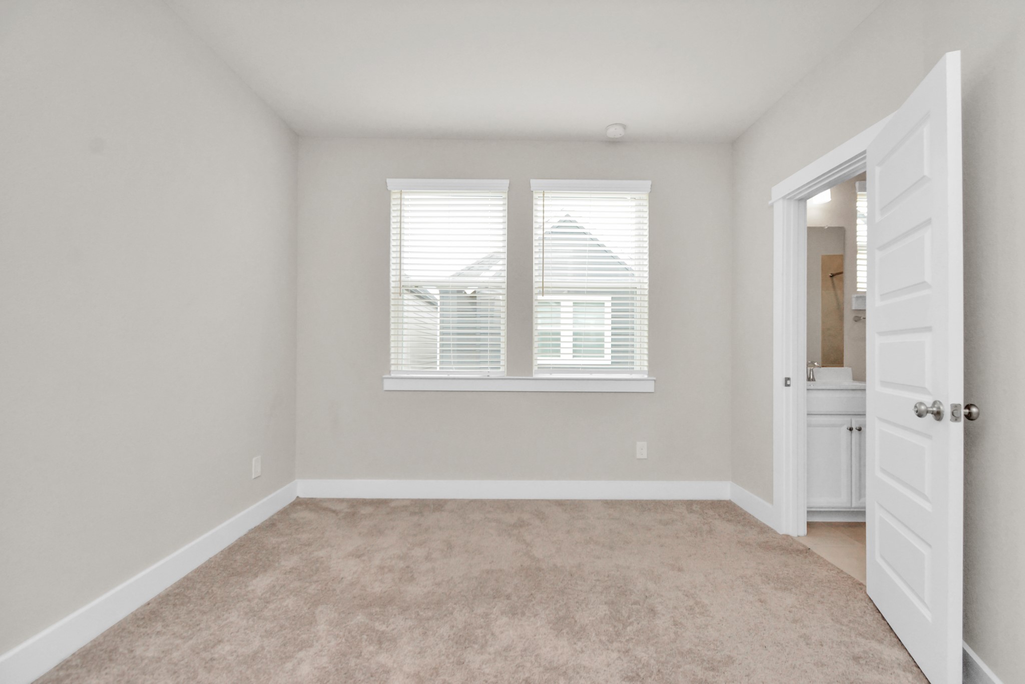 746 Strawberry Pines Court Houston, TX 77009 - Photo 40 of 50 an empty room with windows