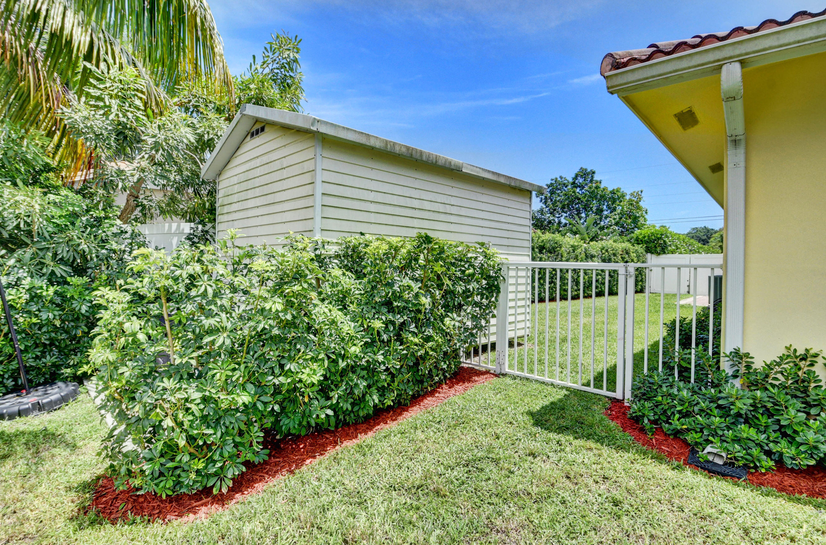 617 Northwest 10th Court Boca Raton, FL 33486 - Photo 44 of 54 Side yard/Shed