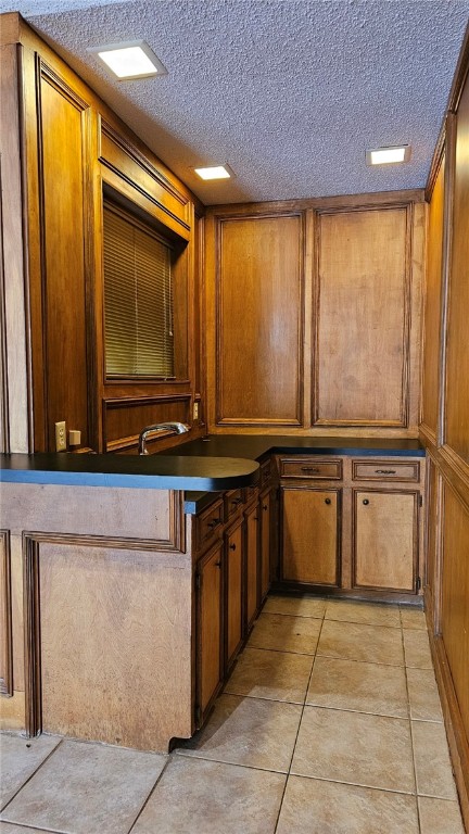 903 Summit Circle Portland, TX 78374 - Photo 15 of 23 a kitchen with a sink and a refrigerator