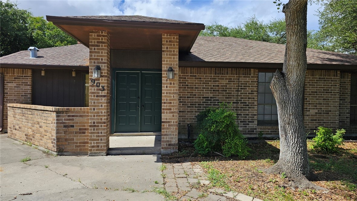 903 Summit Circle Portland, TX 78374 - Photo 2 of 23 a front view of a house with a yard