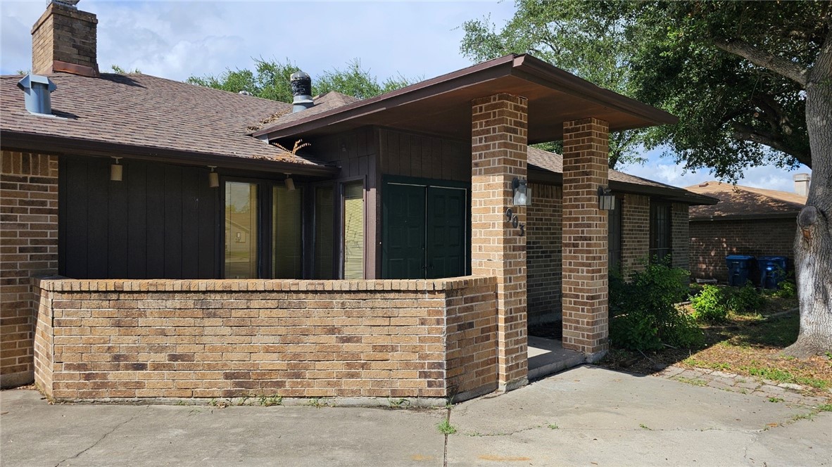 903 Summit Circle Portland, TX 78374 - Photo 3 of 23 a front view of a house with garden