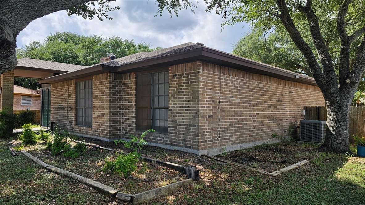 903 Summit Circle Portland, TX 78374 - Photo 6 of 23 a side view of a house with a yard
