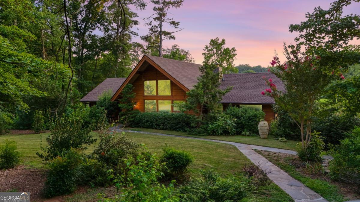 75 Deerfield Road Covington, GA 30014 - Photo 2 of 44 a front view of a house with yard and green space