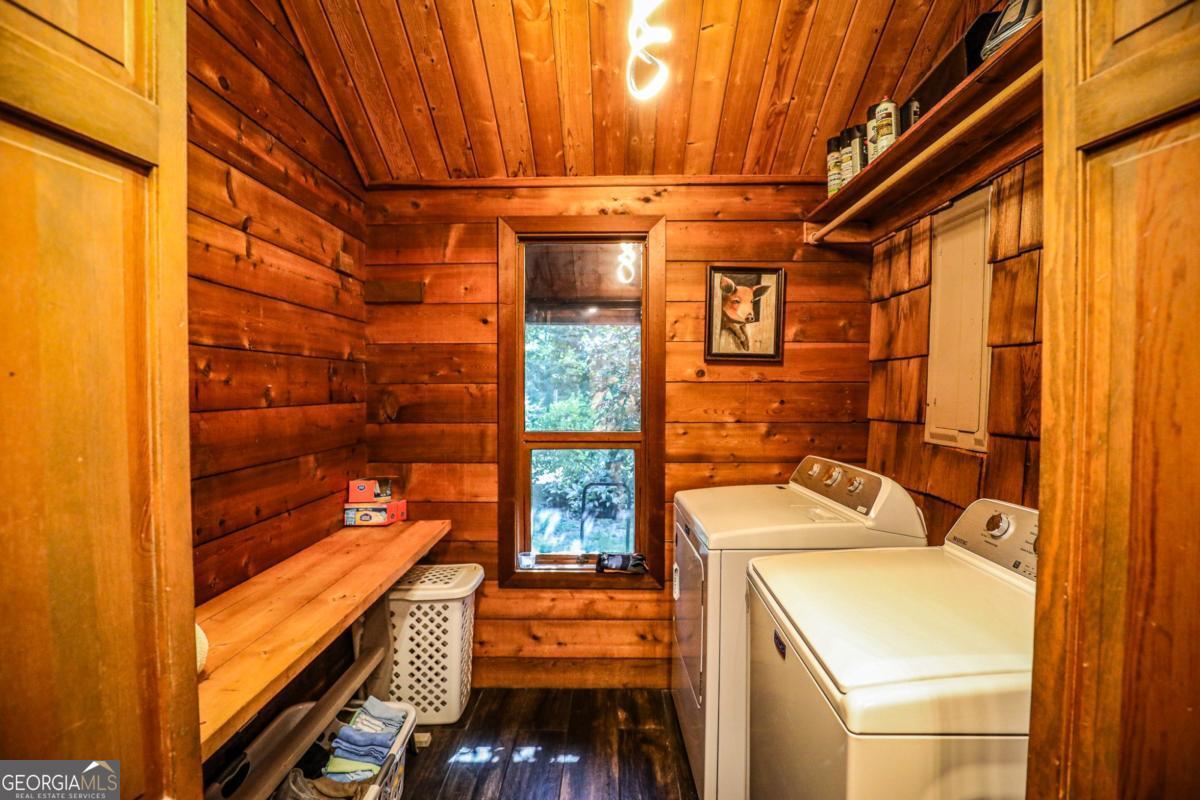 75 Deerfield Road Covington, GA 30014 - Photo 31 of 44 a view of a room with racks on the wall