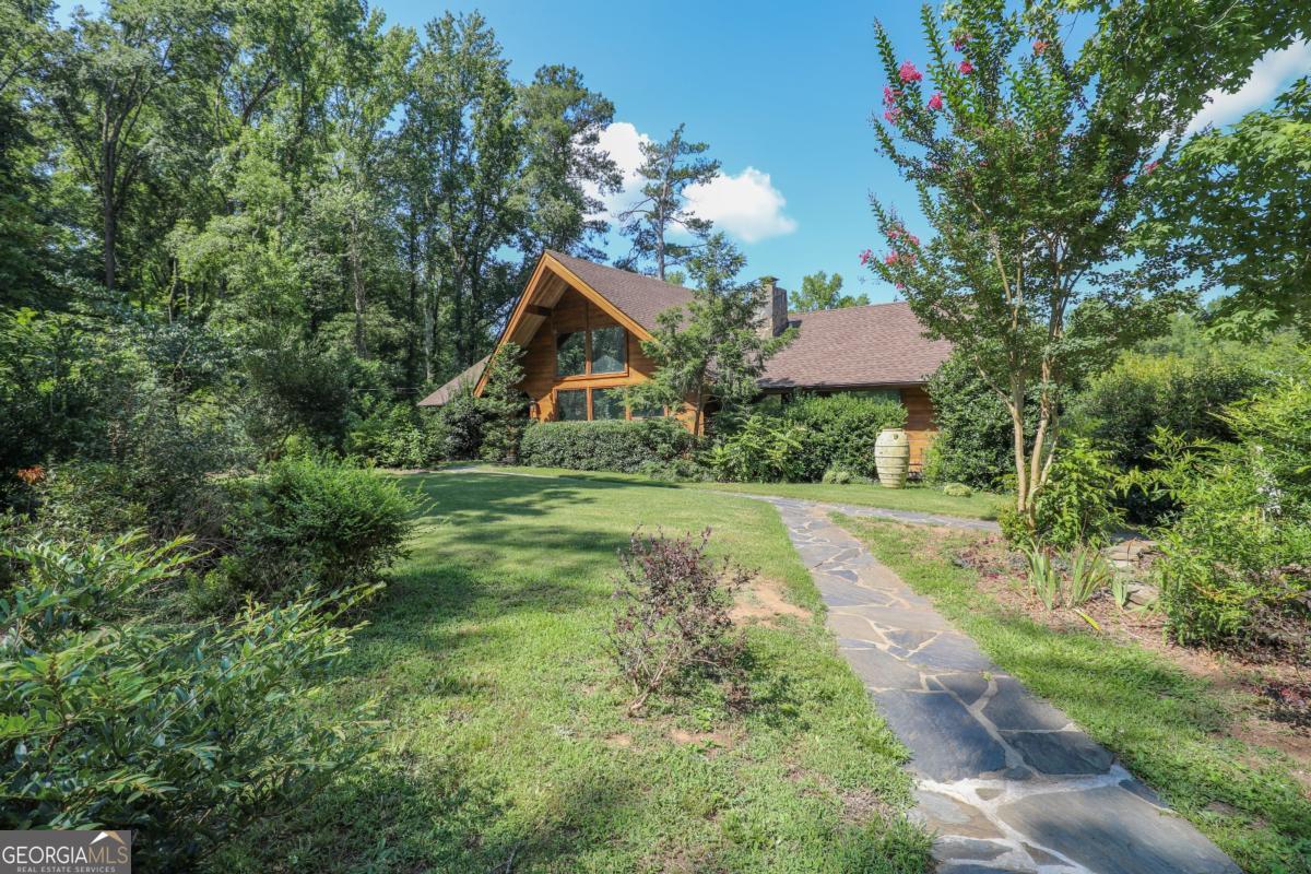 75 Deerfield Road Covington, GA 30014 - Photo 44 of 44 a view of a house with a yard