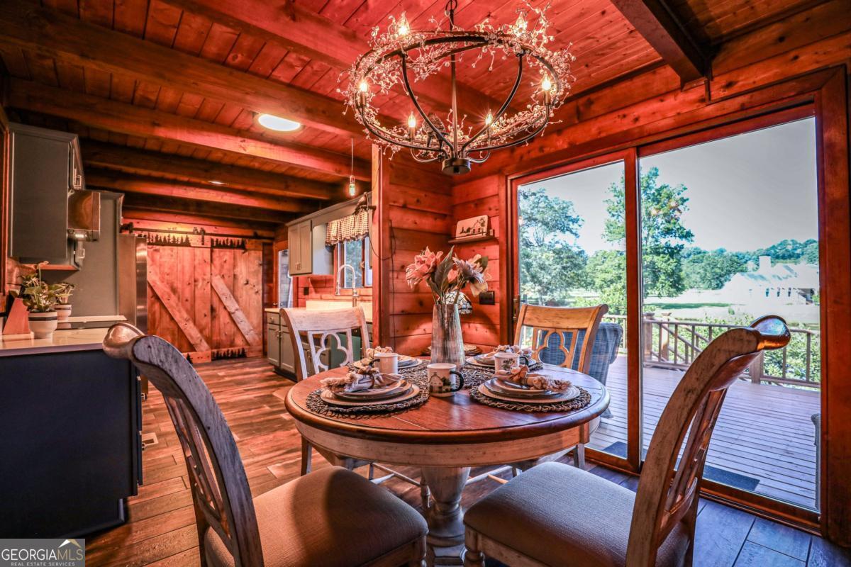 75 Deerfield Road Covington, GA 30014 - Photo 9 of 44 a view of a dining room with furniture window and outside view