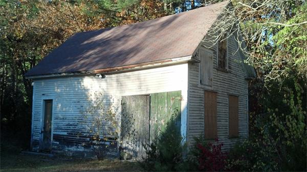 265 Dunstable Road Tyngsborough, MA 01879 - Photo 4 of 12 a view of a house with a yard