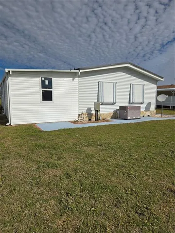 a house view with a sitting space and garden view
