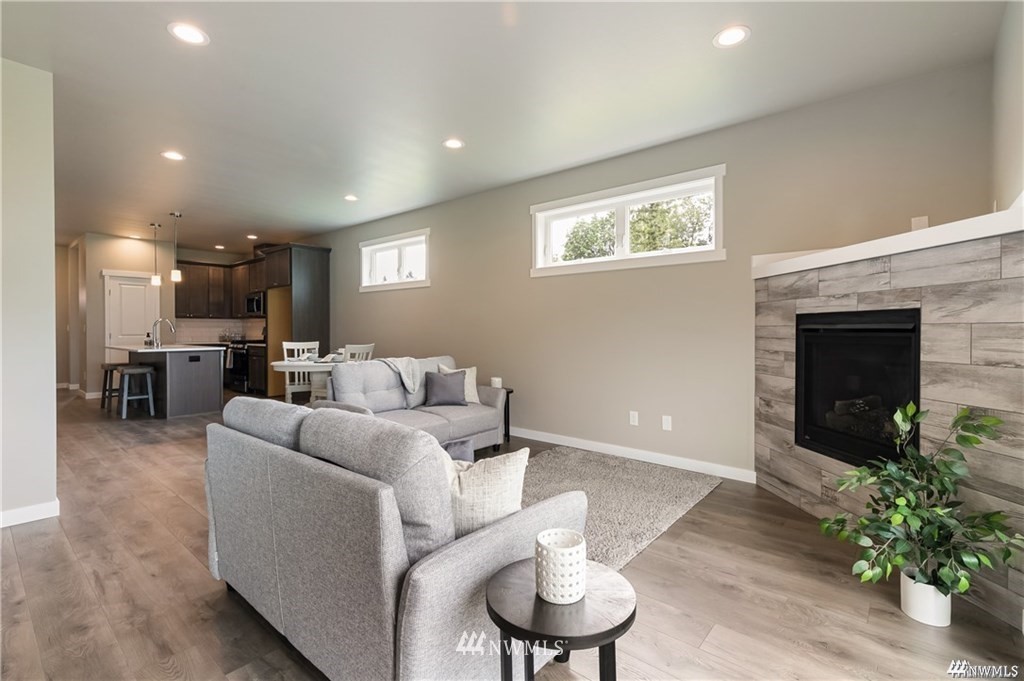 6902 Red Ridge Drive, Unit B Lynden, WA 98264 - Photo 14 of 33 a living room with furniture and a fireplace