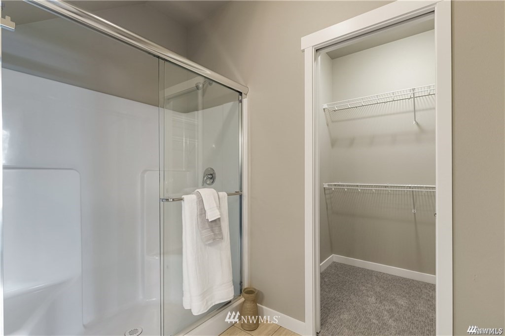 6902 Red Ridge Drive, Unit B Lynden, WA 98264 - Photo 22 of 33 a view of walk in closet with empty racks