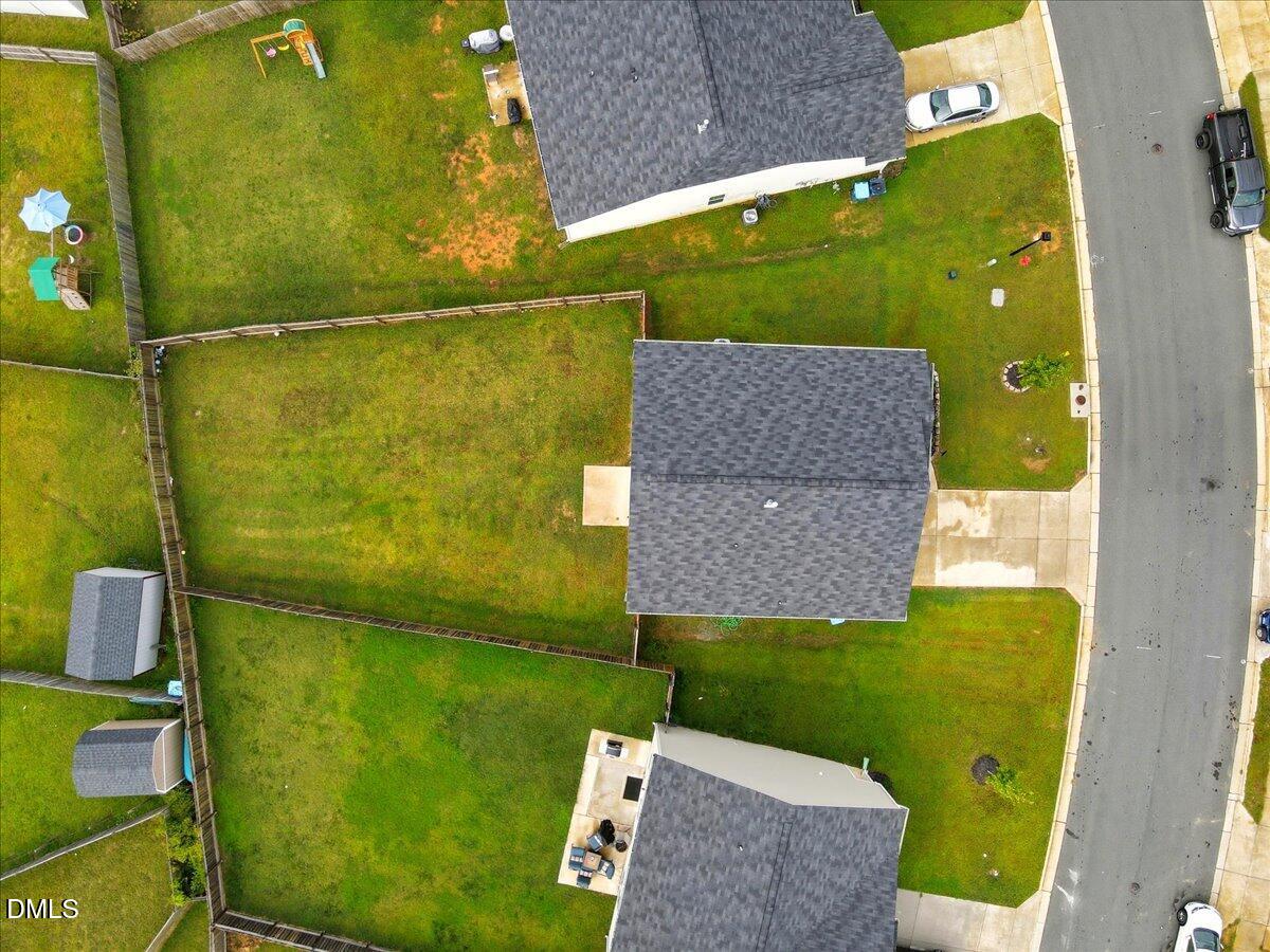 6854 Summerside Drive Whitsett, NC 27377 - Photo 42 of 49 an aerial view of a house having swimming pool