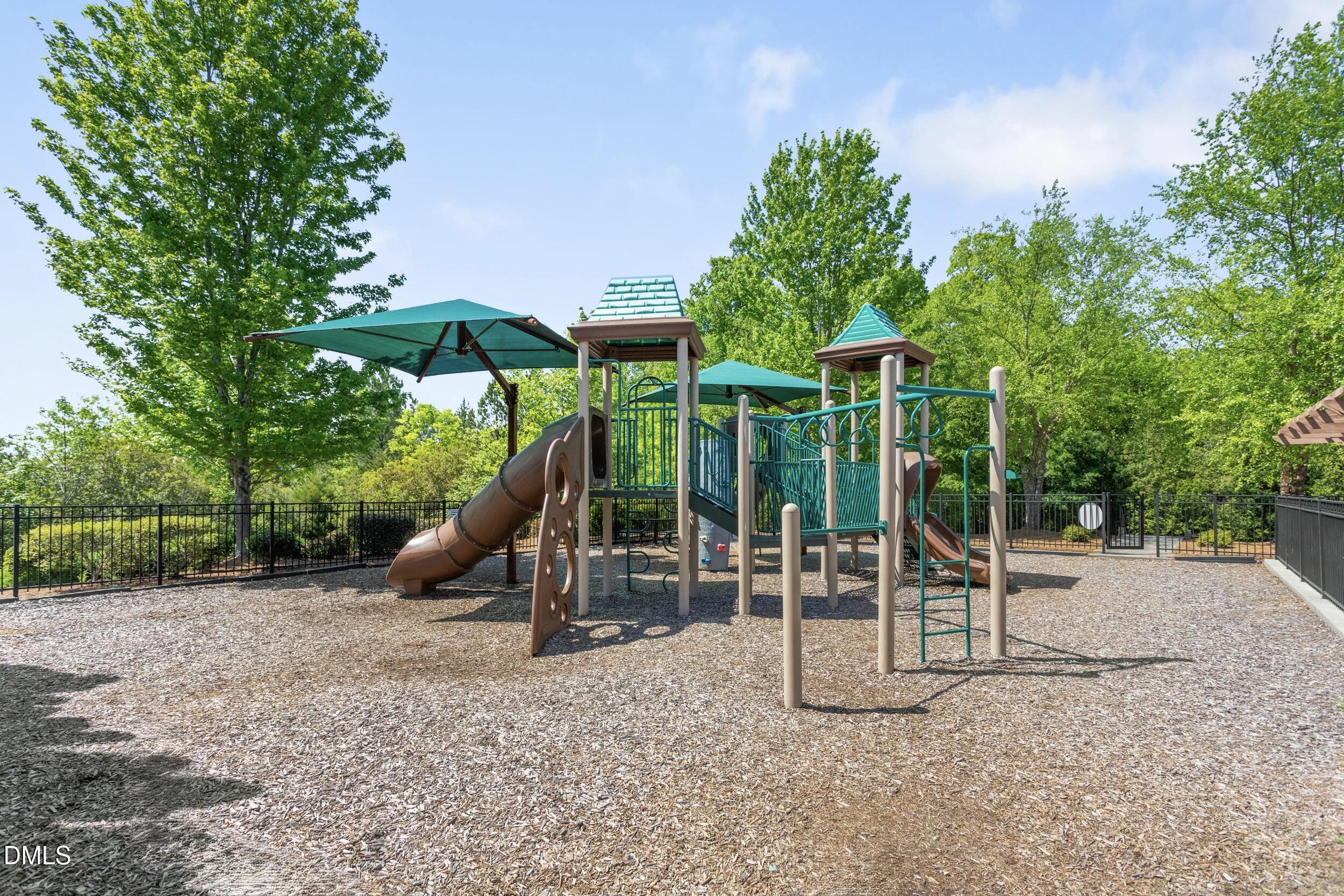 6854 Summerside Drive Whitsett, NC 27377 - Photo 49 of 49 a view of a park with slide