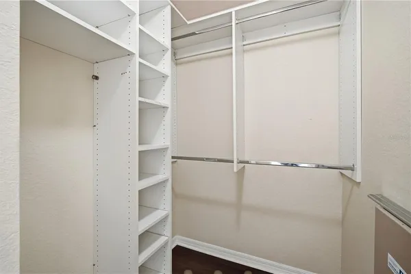a view of a livingroom with a hardwood and a shower