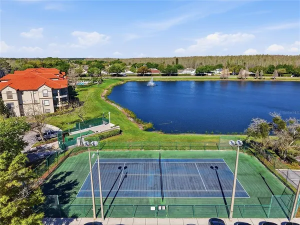 a view of a lake with a city
