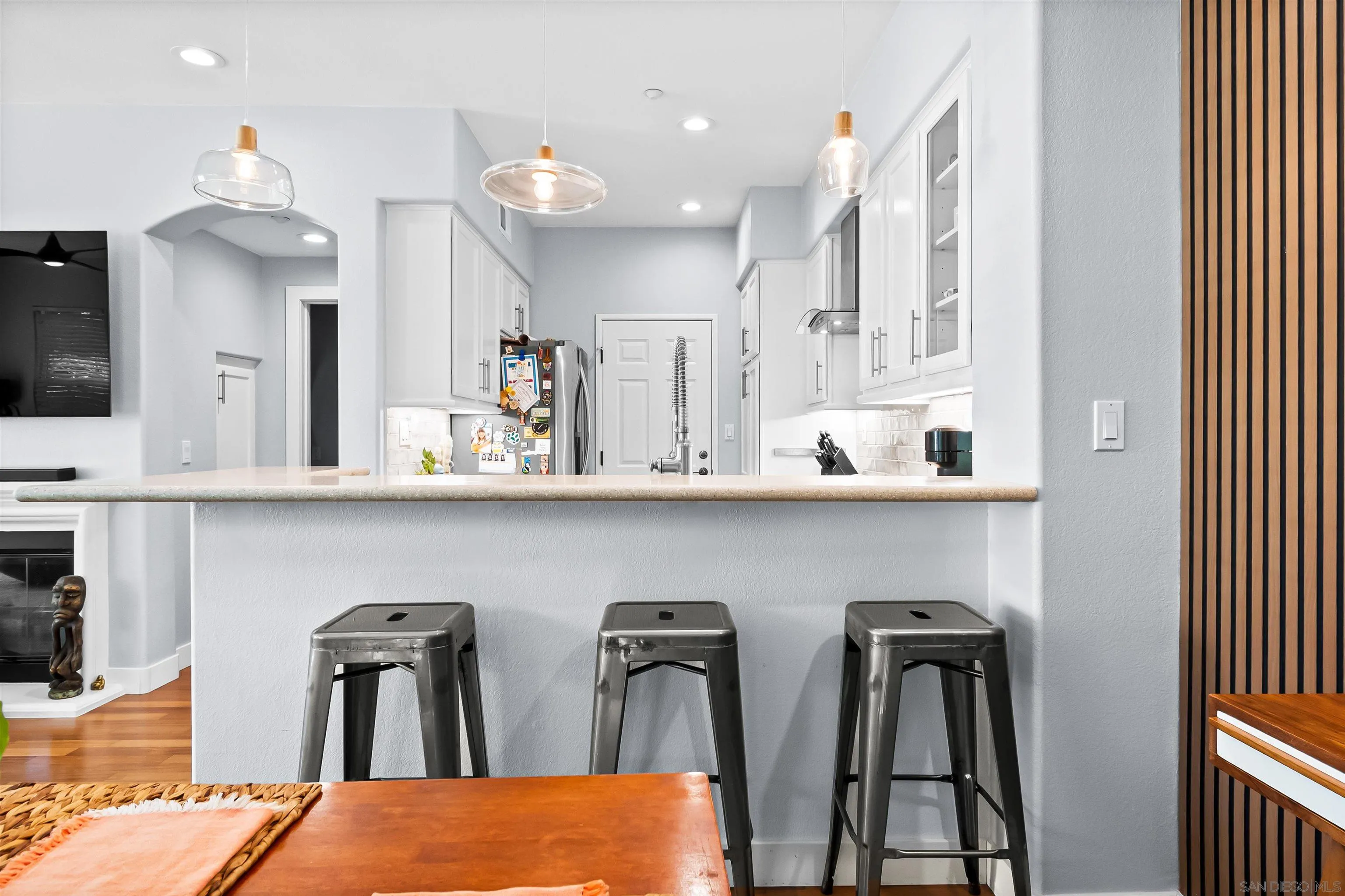 1184 Highbluff Avenue San Marcos, CA 92078 - Photo 12 of 63 a kitchen with stainless steel appliances granite countertop refrigerator and cabinets
