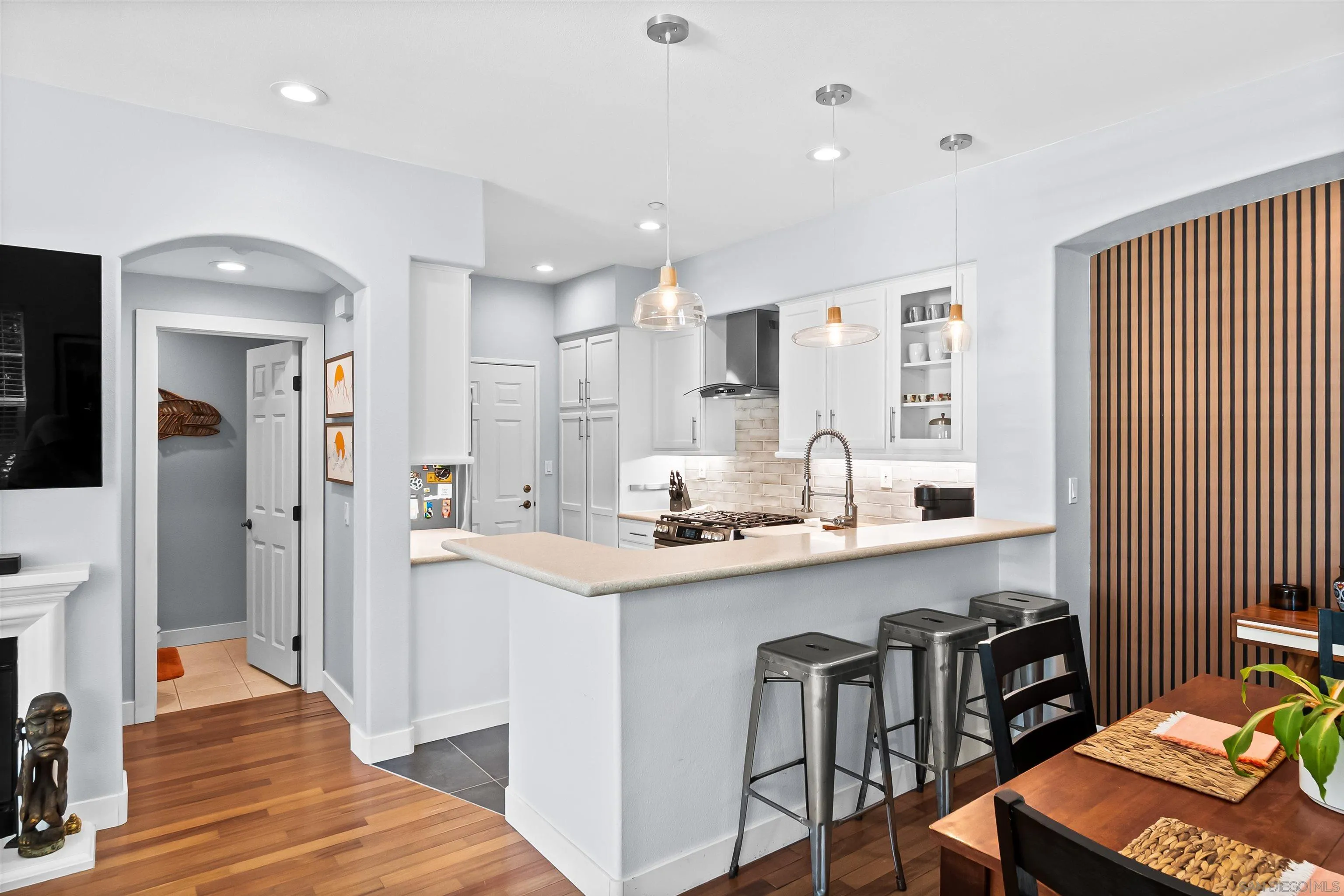 1184 Highbluff Avenue San Marcos, CA 92078 - Photo 13 of 63 a kitchen with granite countertop a sink and cabinets