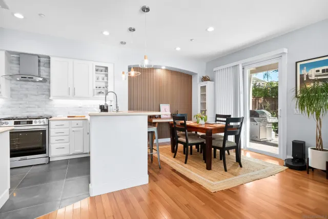 a spacious bedroom with a bed and a window