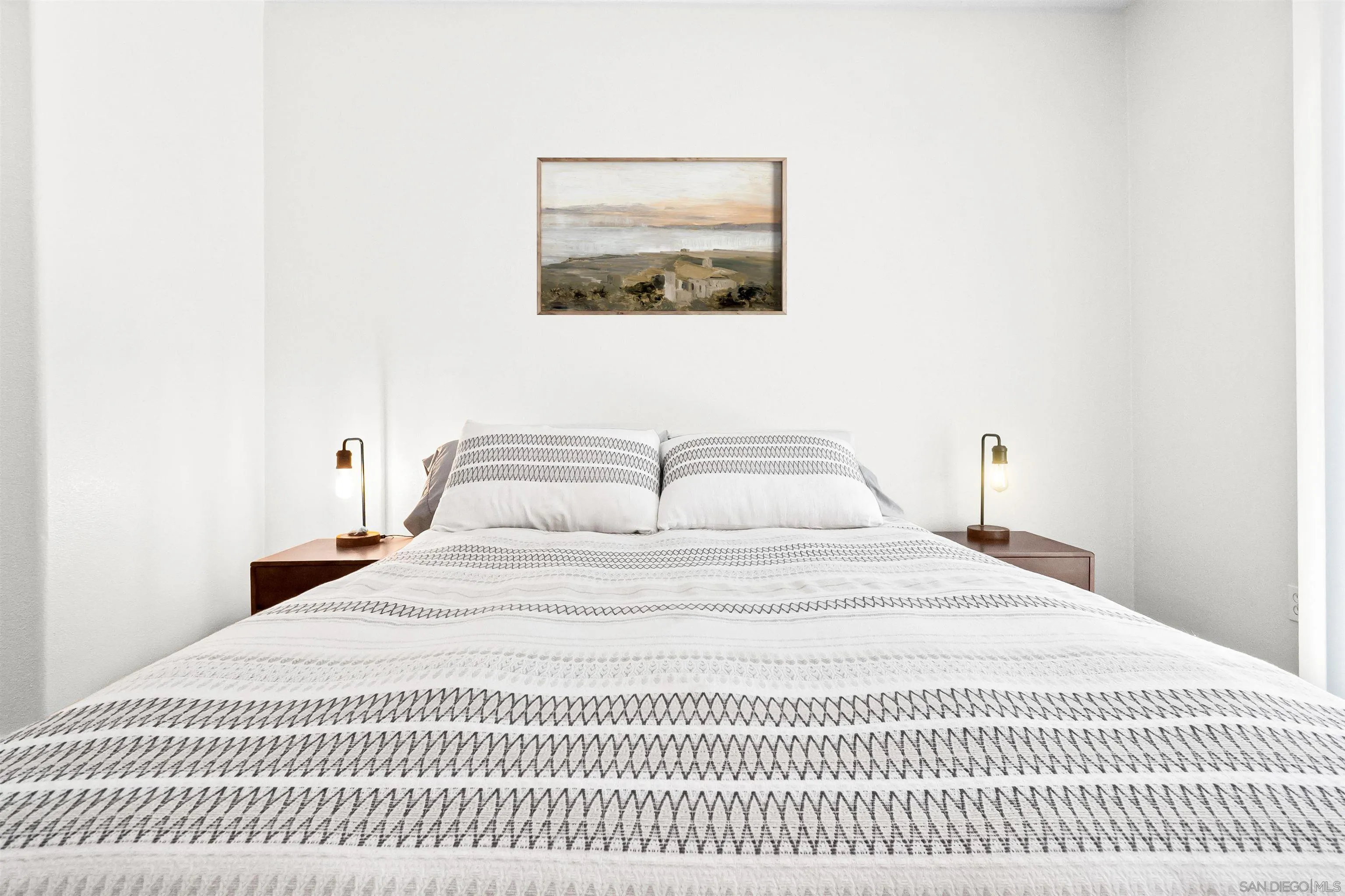 1184 Highbluff Avenue San Marcos, CA 92078 - Photo 27 of 63 a bedroom with a white bed and a white wall