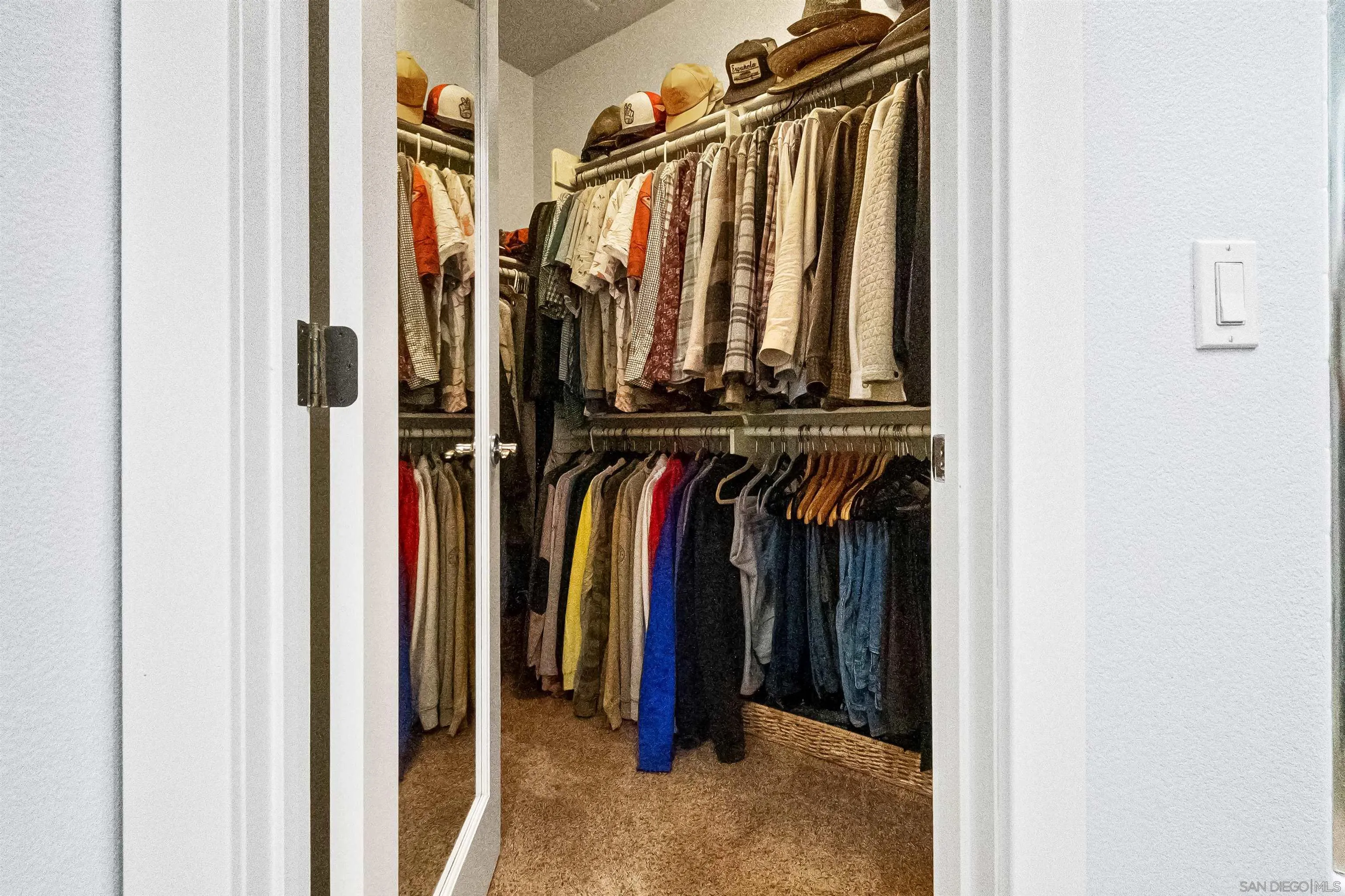 1184 Highbluff Avenue San Marcos, CA 92078 - Photo 32 of 63 a view of walk in closet with clothes