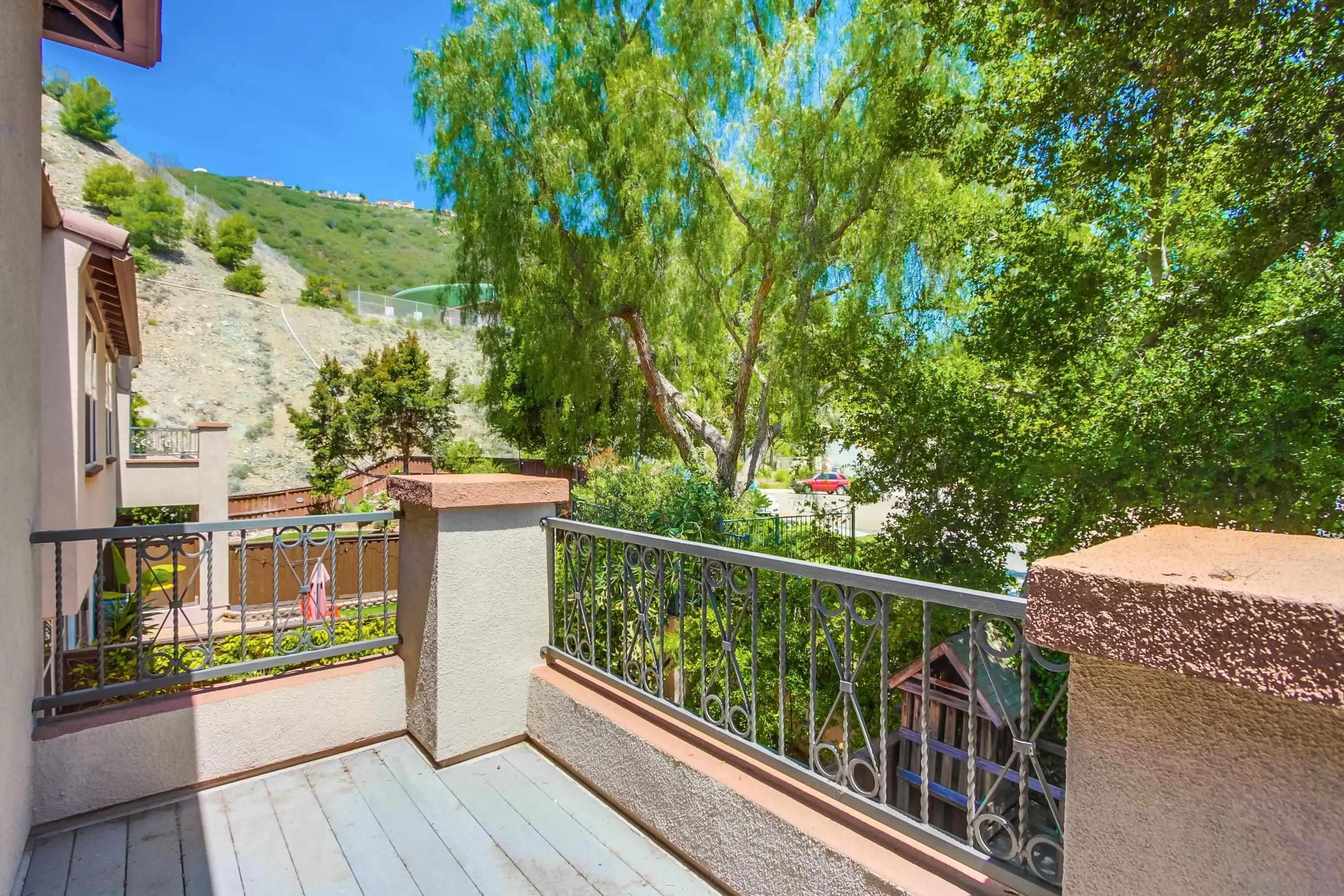 1184 Highbluff Avenue San Marcos, CA 92078 - Photo 34 of 63 a view of a balcony with wooden floor