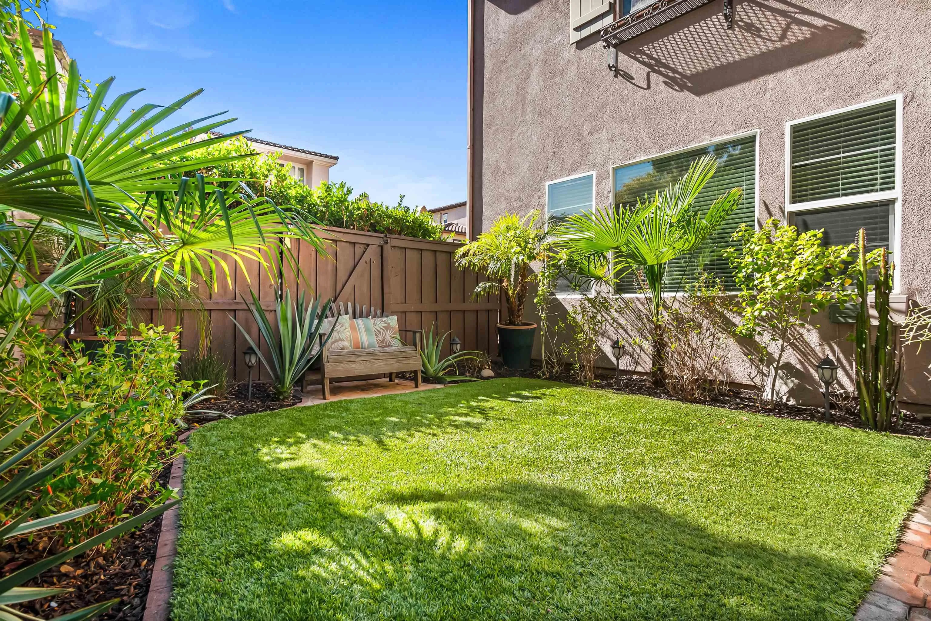 1184 Highbluff Avenue San Marcos, CA 92078 - Photo 44 of 63 a backyard of a house with lots of green space