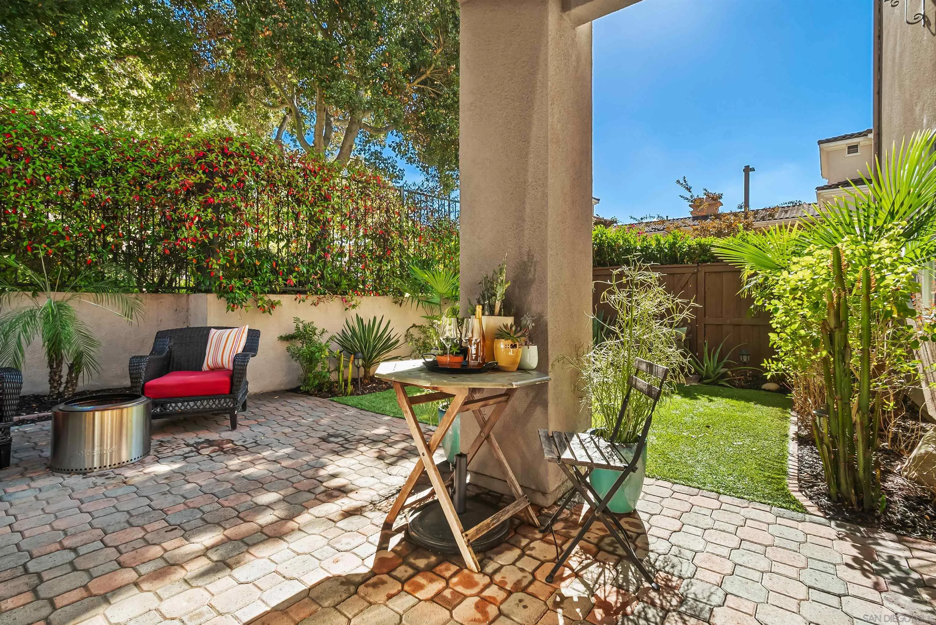 1184 Highbluff Avenue San Marcos, CA 92078 - Photo 47 of 63 a view of a chairs and table in backyard