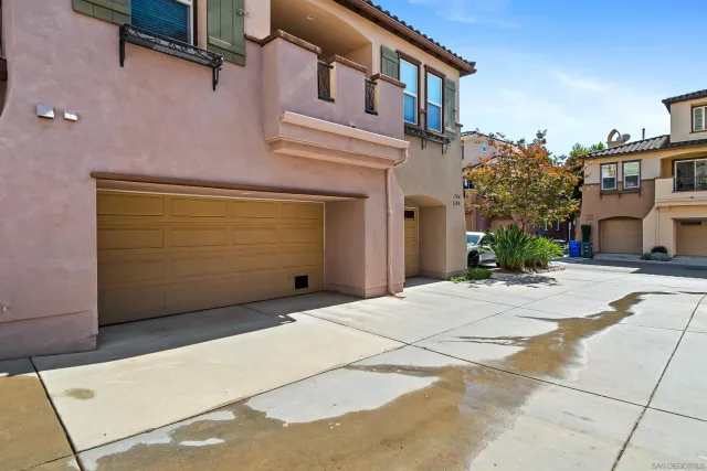 front view of a house with a small yard