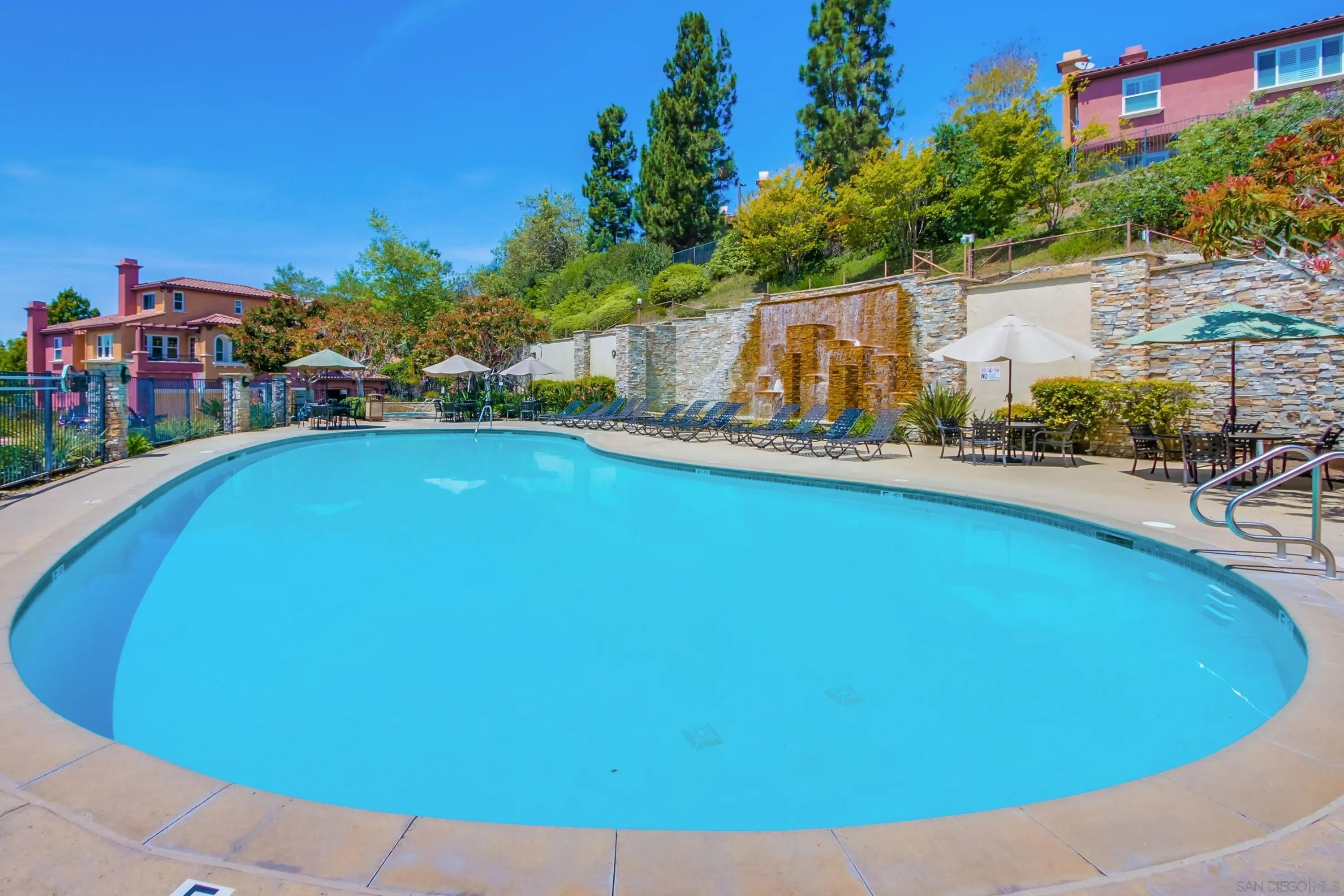 1184 Highbluff Avenue San Marcos, CA 92078 - Photo 51 of 63 a view of a swimming pool and a terrace
