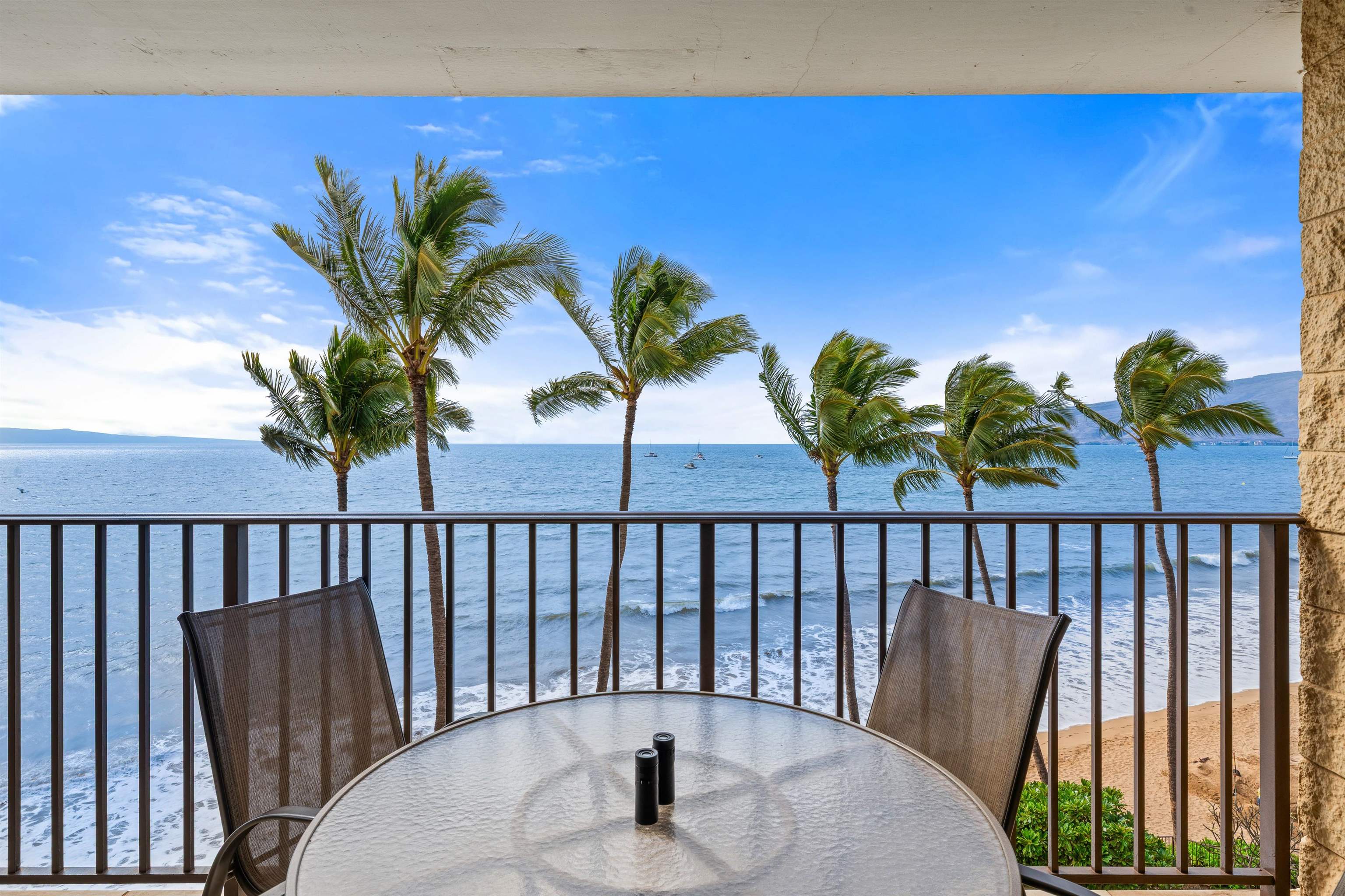 36 South Kihei Road, Unit 603 Kihei, HI 96753 - Photo 14 of 37 a balcony with outdoor seating
