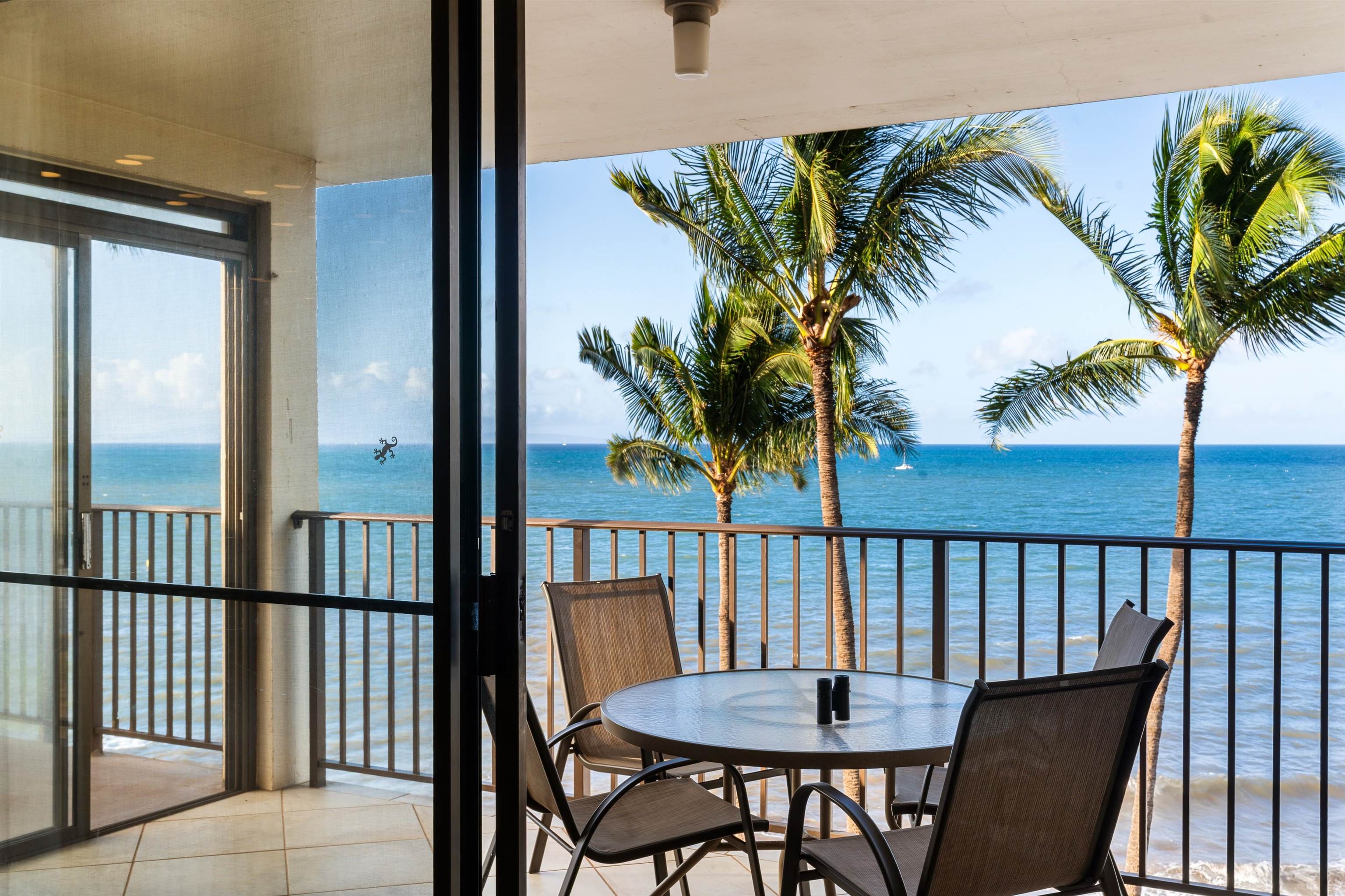 36 South Kihei Road, Unit 603 Kihei, HI 96753 - Photo 16 of 37 a view of a balcony with a table and chairs