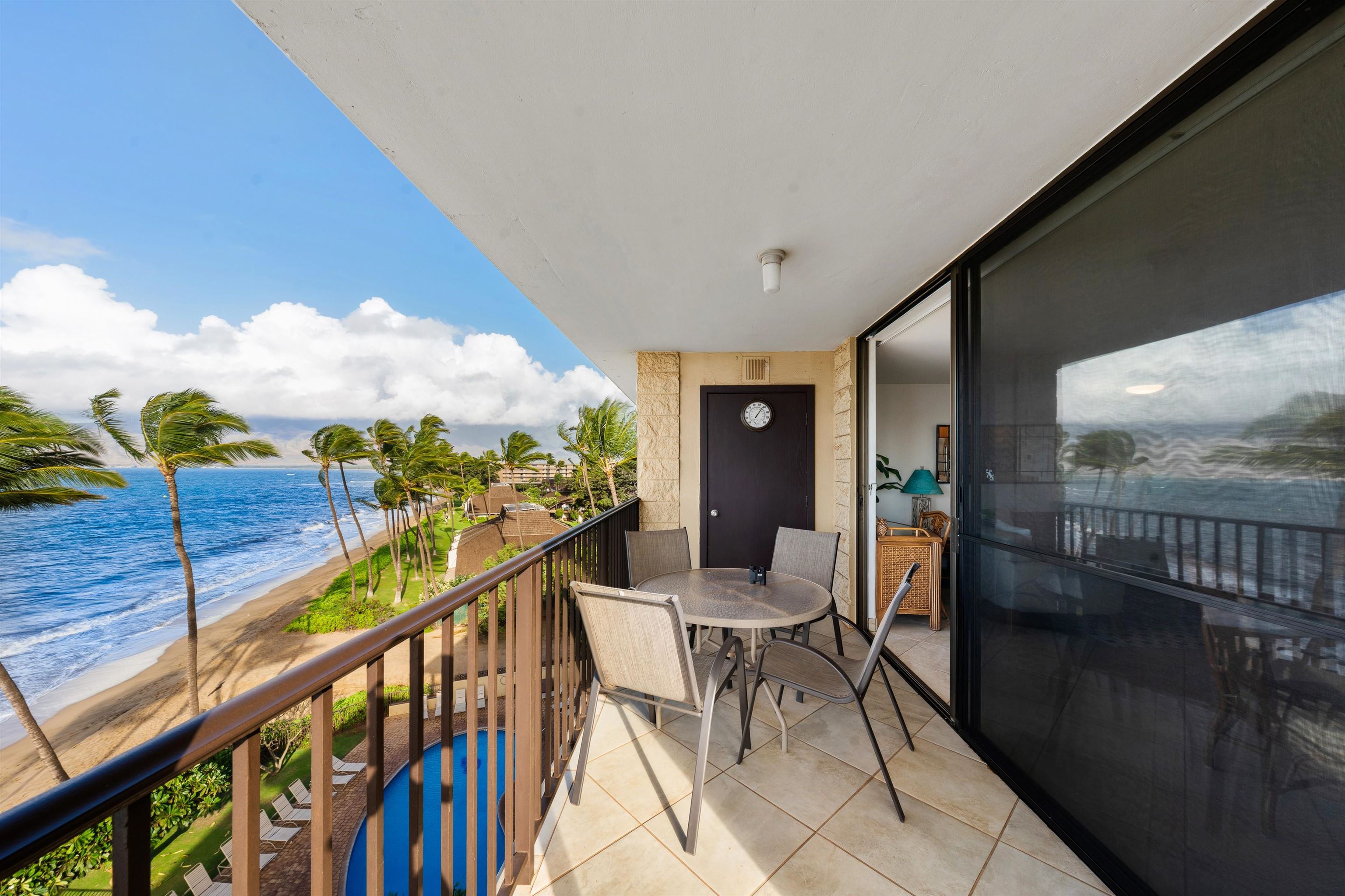 36 South Kihei Road, Unit 603 Kihei, HI 96753 - Photo 22 of 37 a view of a chairs and table in the balcony