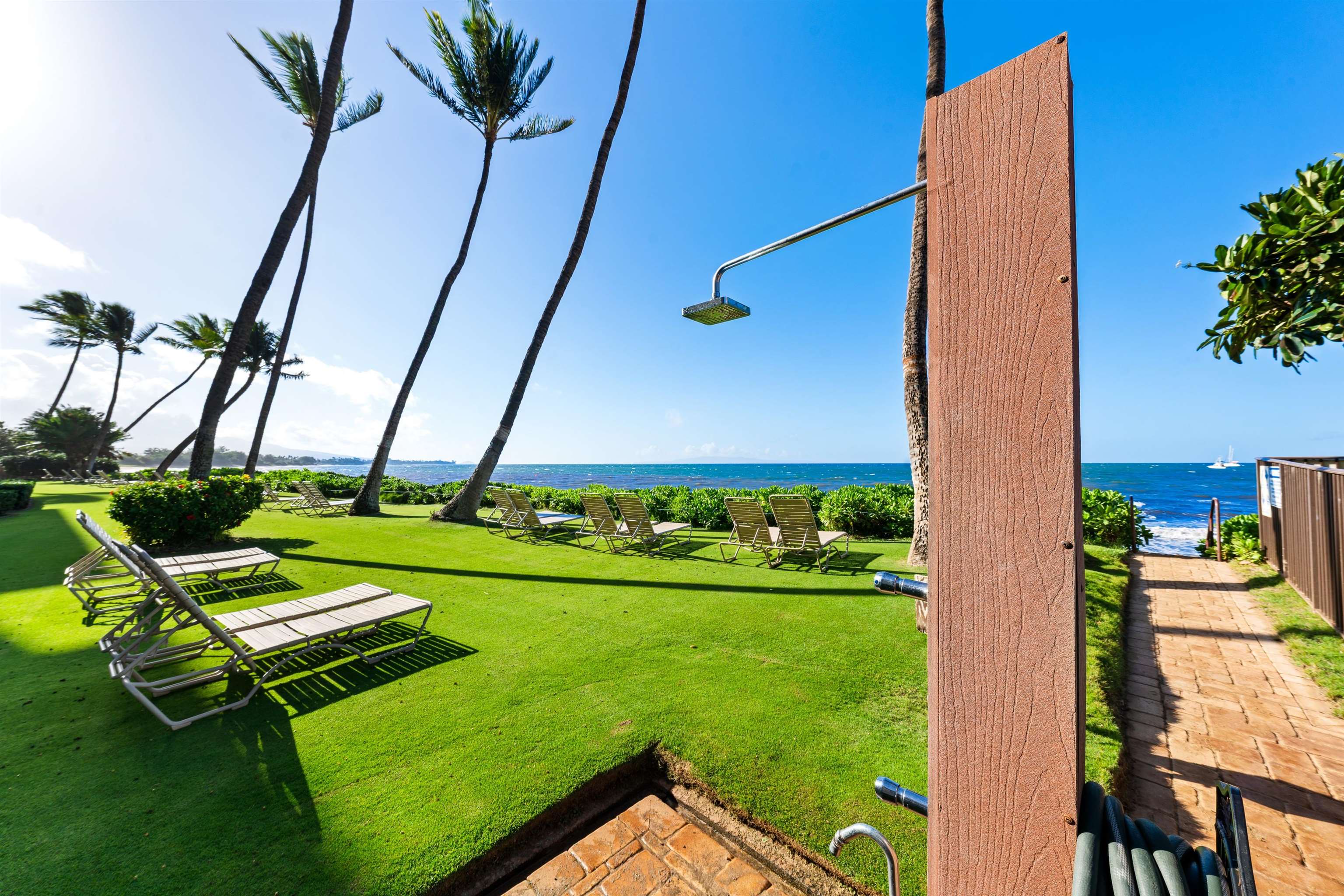 36 South Kihei Road, Unit 603 Kihei, HI 96753 - Photo 30 of 37 a view of a backyard with chairs