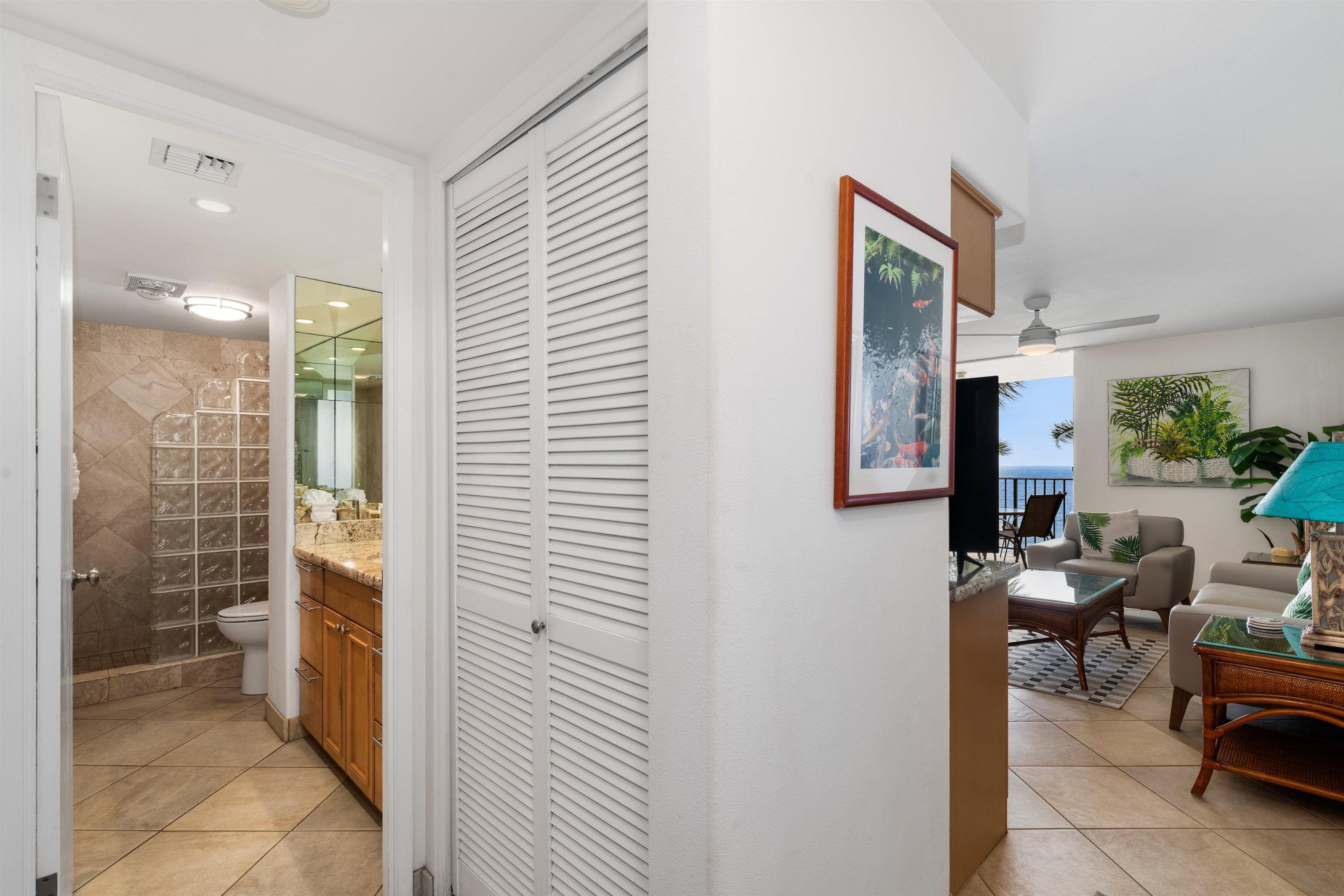 36 South Kihei Road, Unit 603 Kihei, HI 96753 - Photo 9 of 37 a bathroom with a sink and a mirror