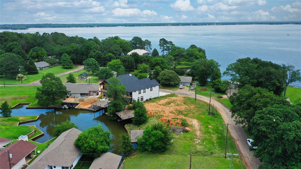97 Hilltop Trinidad, TX 75163 - Photo 12 of 13 an aerial view of a house with a yard and lake view