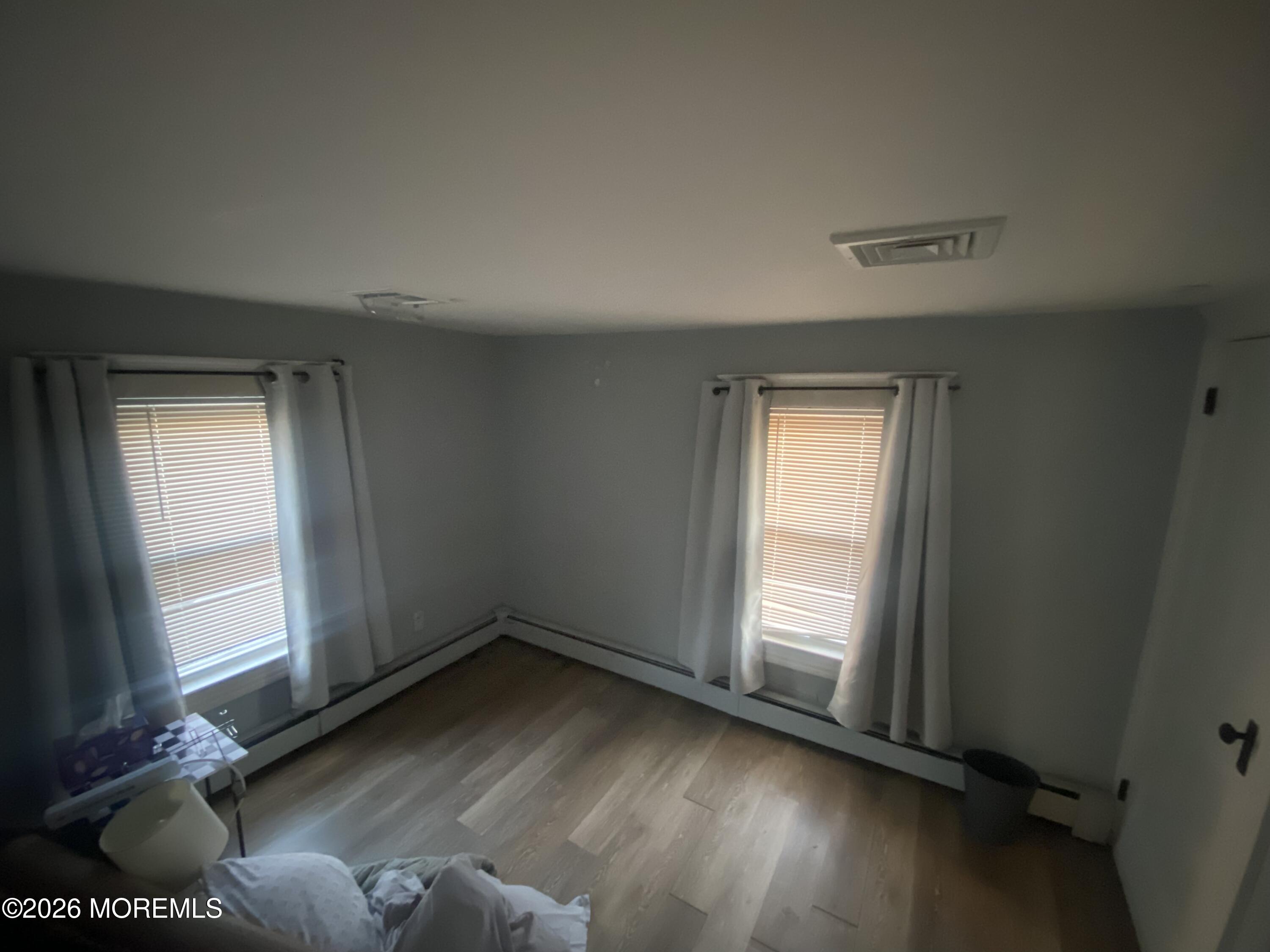 1302 L Street Belmar, NJ 07719 - Photo 8 of 14 an empty room with windows