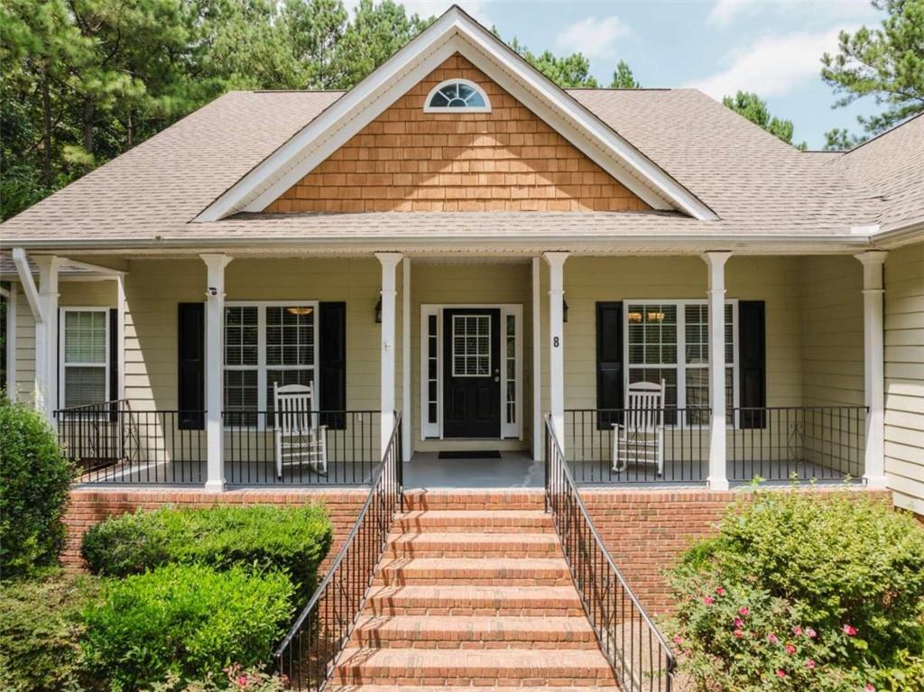 8 Triple Crown Court Southeast Rome, GA 30161 - Photo 1 of 1 a front view of a house with a garden