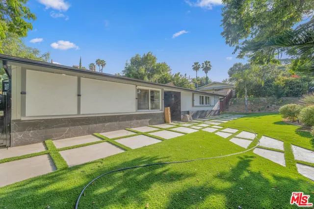 a view of a house with a patio